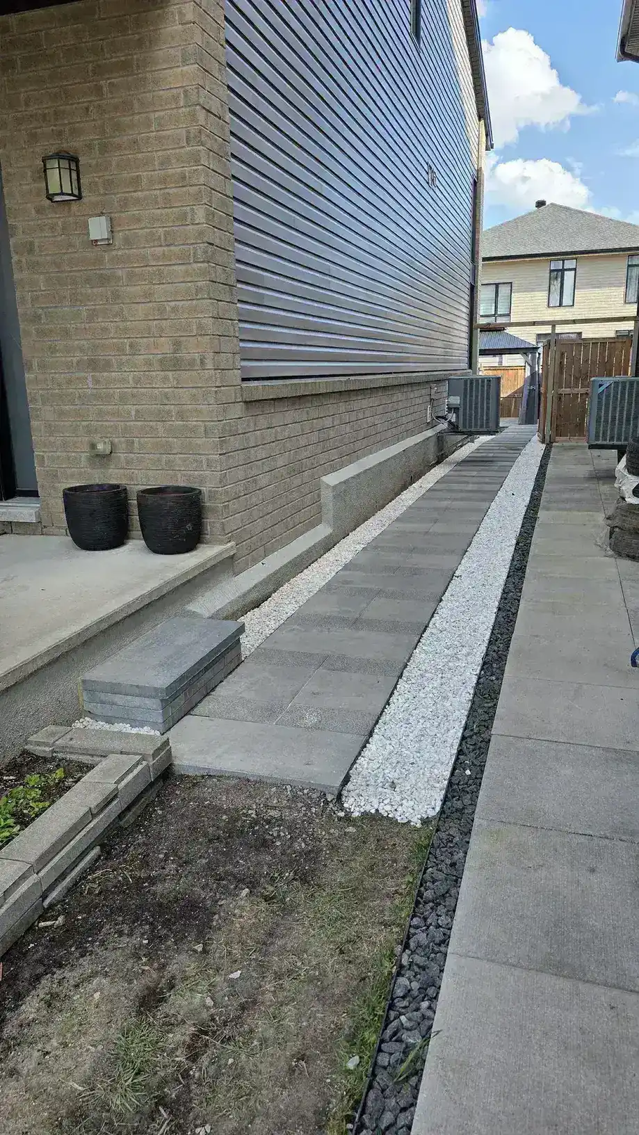 Side Walkway and Backyard Patio in Riverside South — photo 10